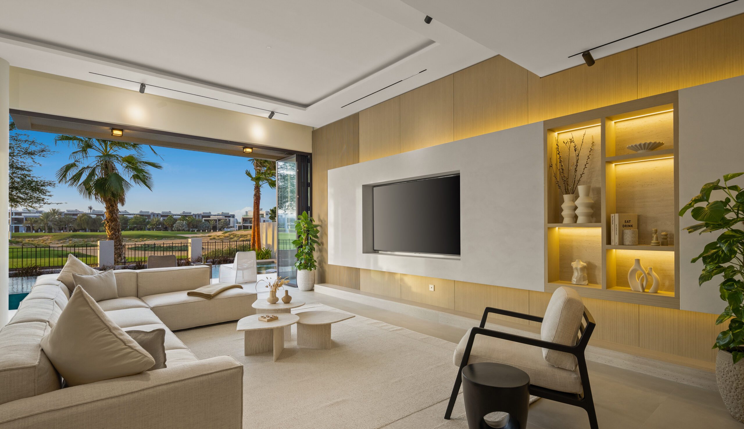 A finished villa in Dubai, the living area opening onto the golf course
